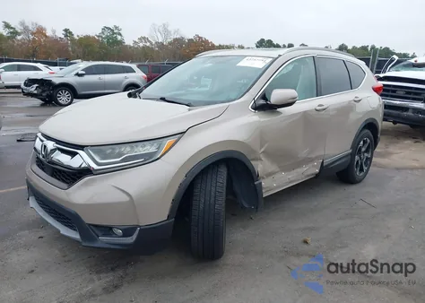 2019 Honda Cr-V Touring z USA, uszkodzony, nr VIN 5J6RW1H94KL002764